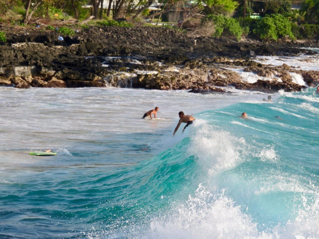surfing at magic sands beach