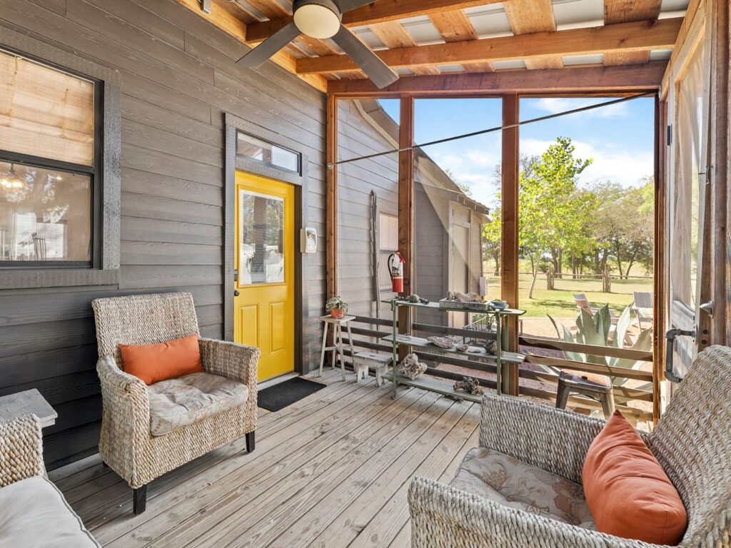 Camp Comfort Cabin Porch, best wedding venues in Texas