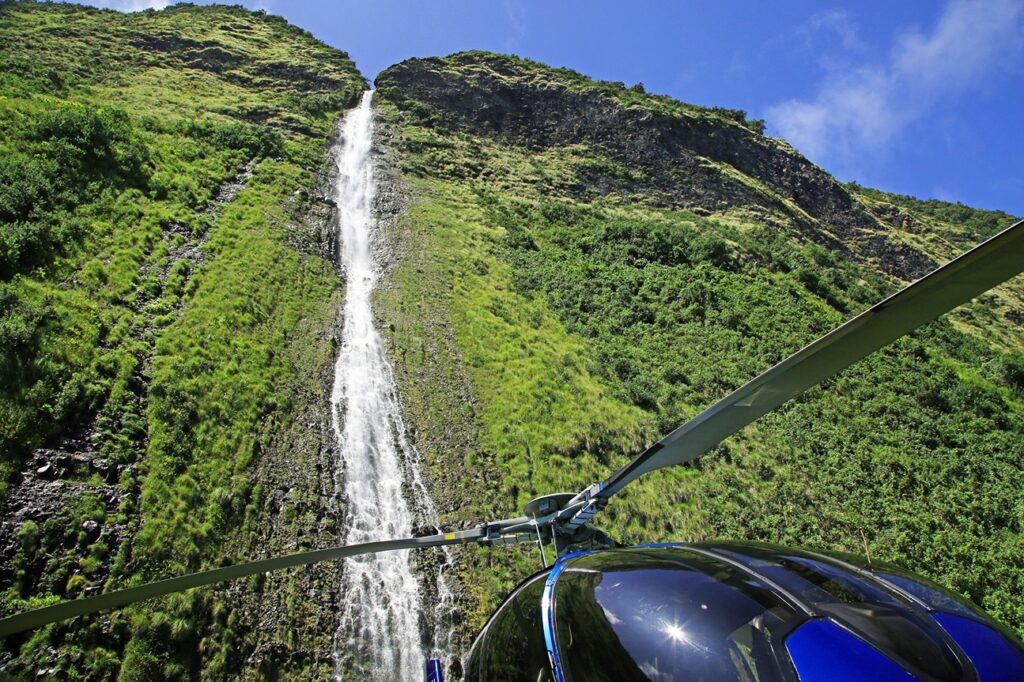 Best activities on the Big Island: fly by a waterfall on the Kohala Coast