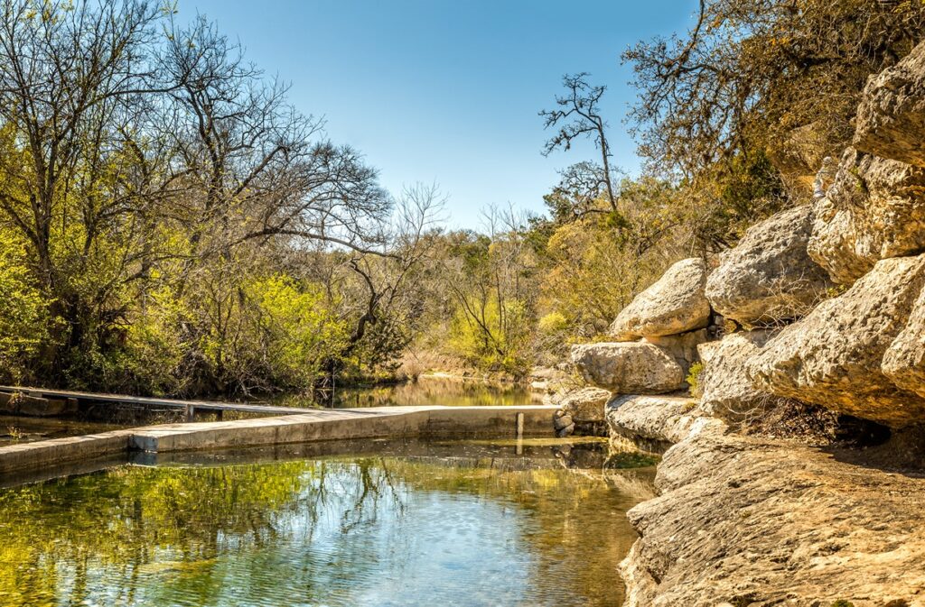 Warm Fall Vacation Spots: Explore Jacob's Well in Texas Hill Country