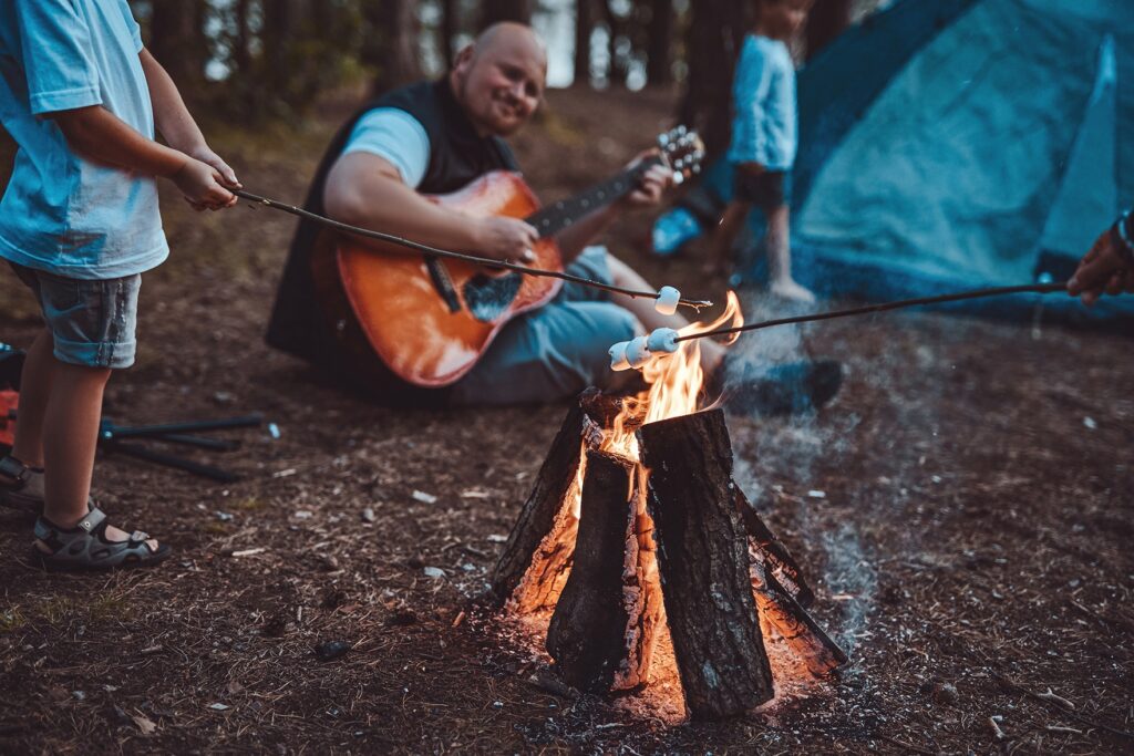 Best Time to Travel to North Carolina: Family Roasting Marshmallows by a Campfire