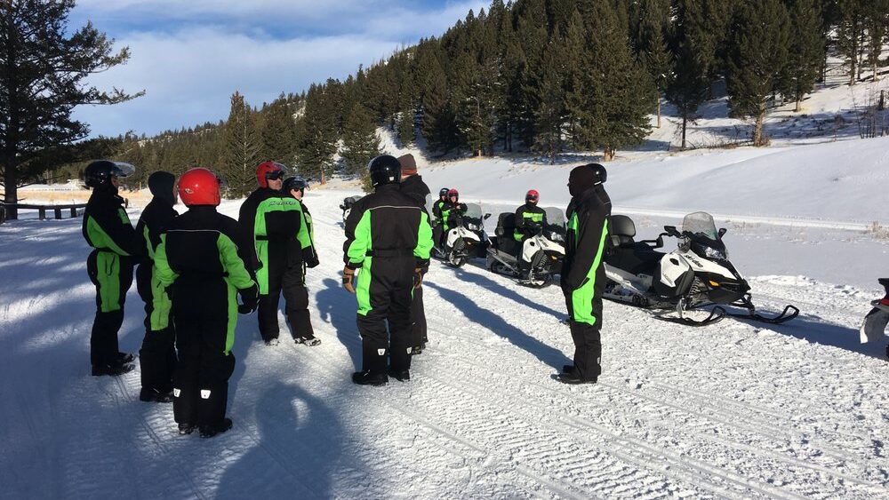 Group of People on Snow Mobile Rentals