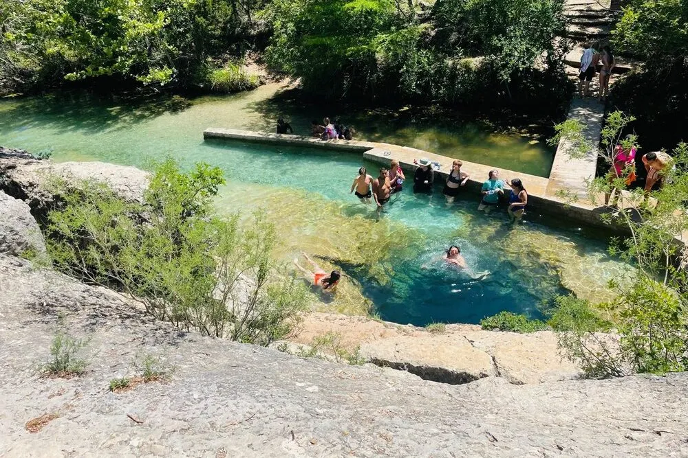 Best Swimming Holes in Texas: Kids at Jacob's Well