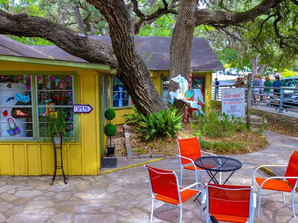 Bright yellow gift shop in Wimberley, a charming stop to include on a texas travel itinerary.
