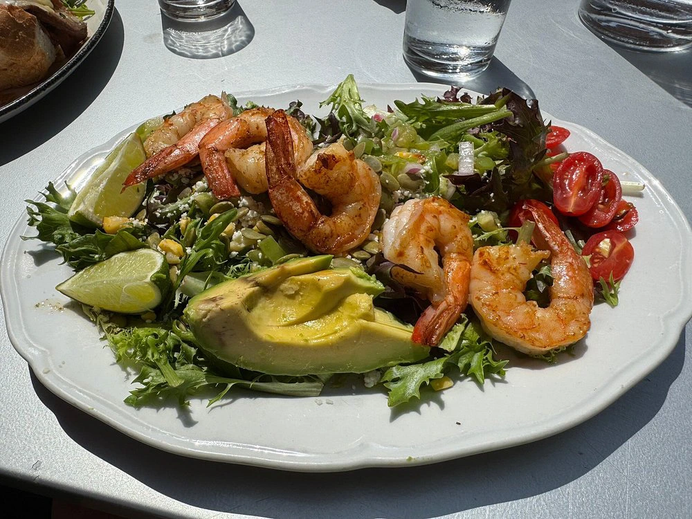 Grilled shrimp salad with avocado and lime at Hill and Vine, one of the best restaurants in fredericksburg tx.