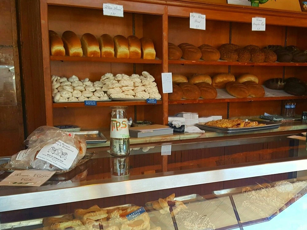 Shelves of fresh bread and pastries at Old German Bakery, one of the best restaurants in fredericksburg tx.
